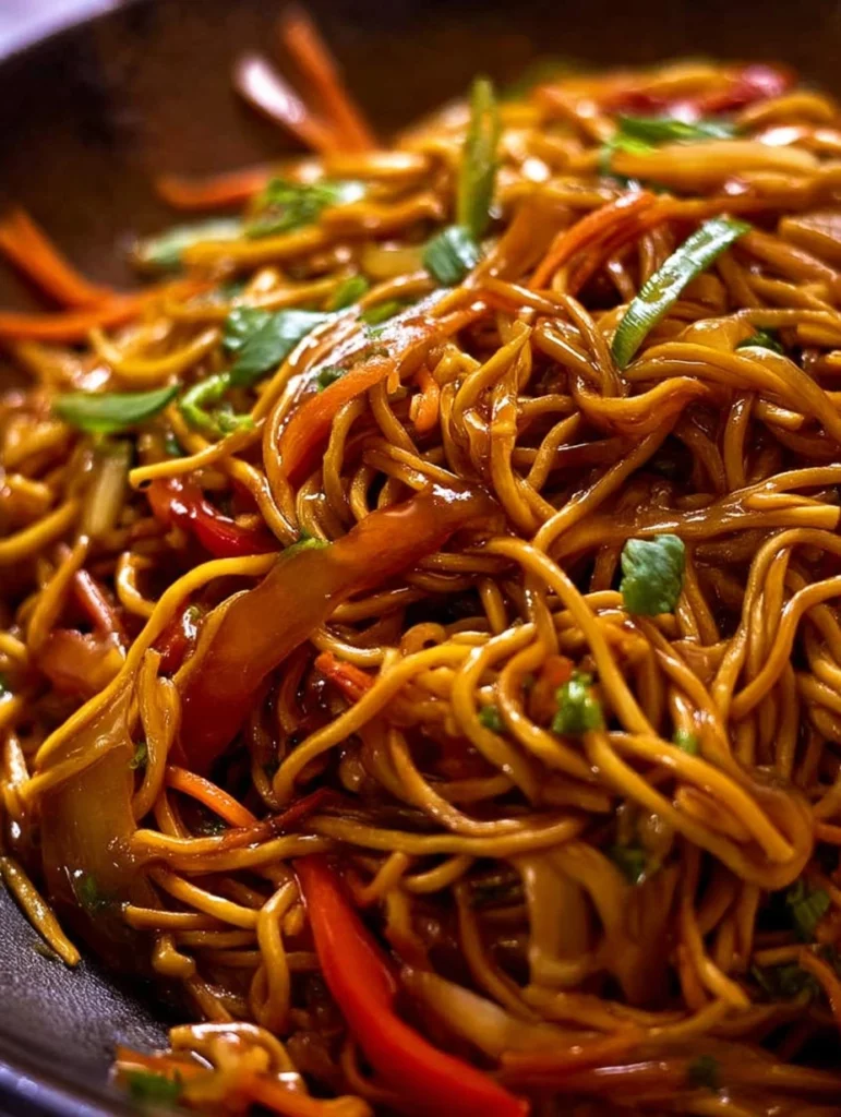 Delicious Lo Mein noodles with colorful vegetables and savory sauce.