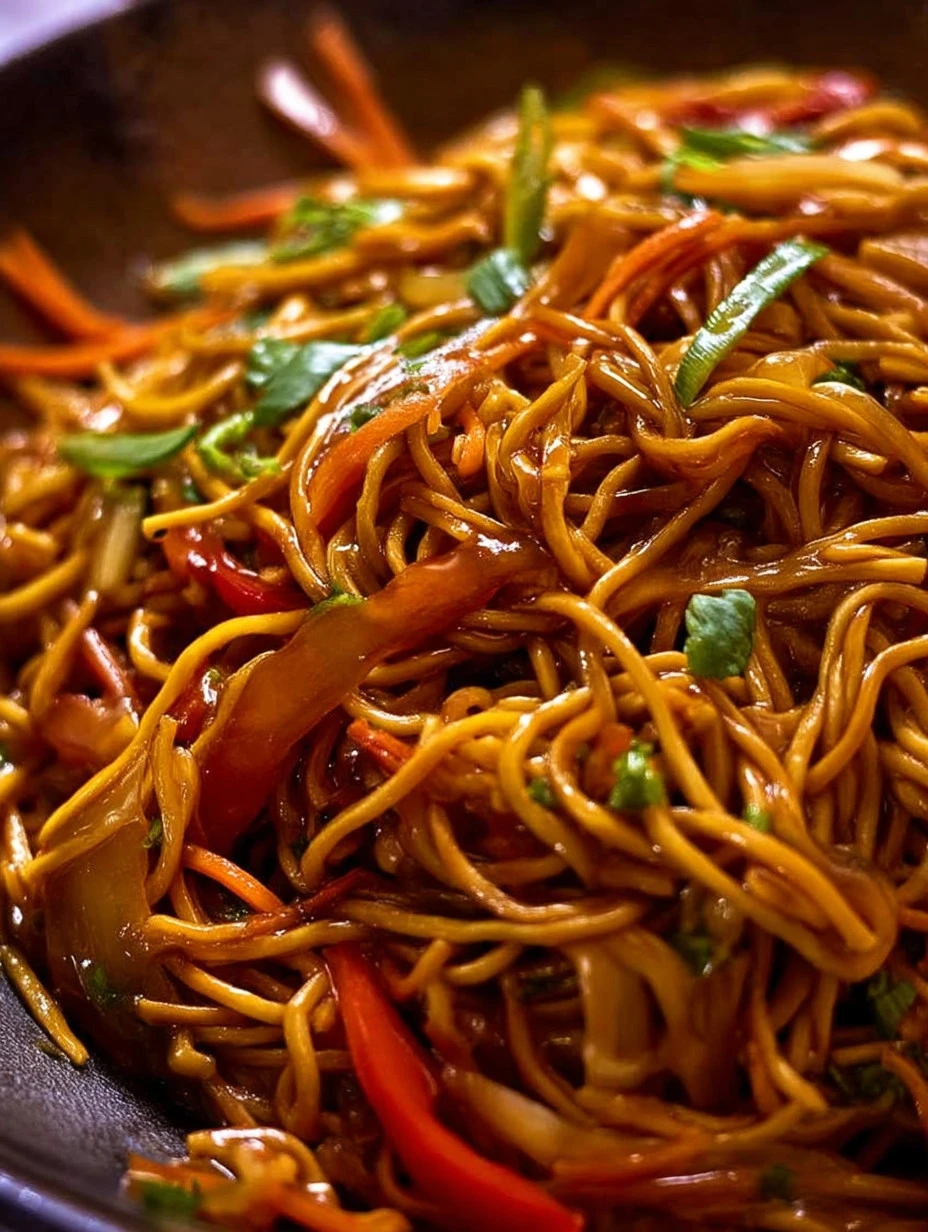 Delicious Lo Mein noodles with colorful vegetables and savory sauce.