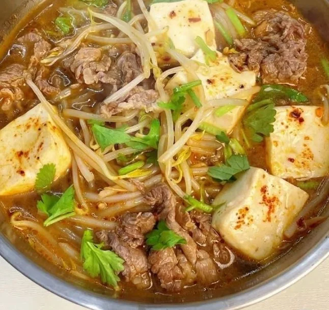 Delicious beef tofu soup featuring beef, tofu, and bean sprouts
