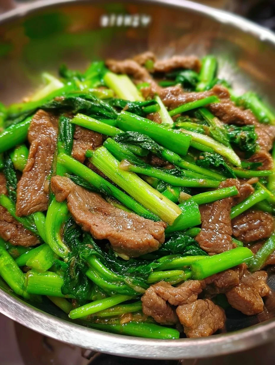 Stir-fried Beef with water spinach served on a plate