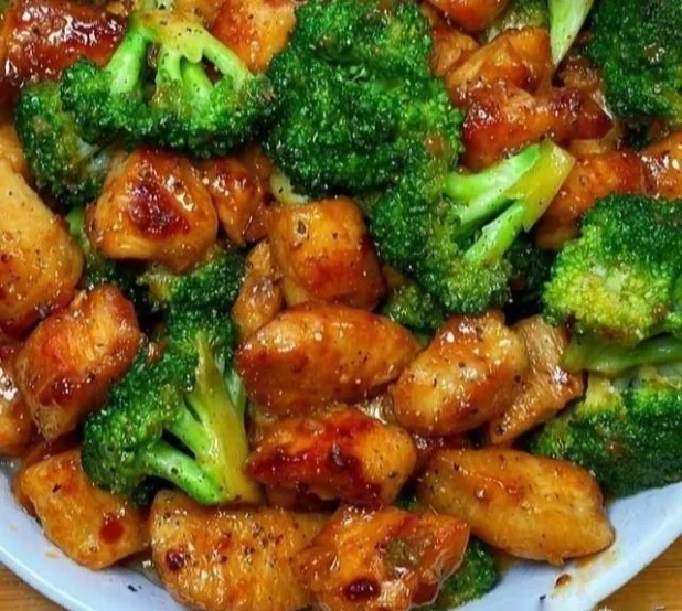 Delicious stir-fried chicken and broccoli dish on a plate