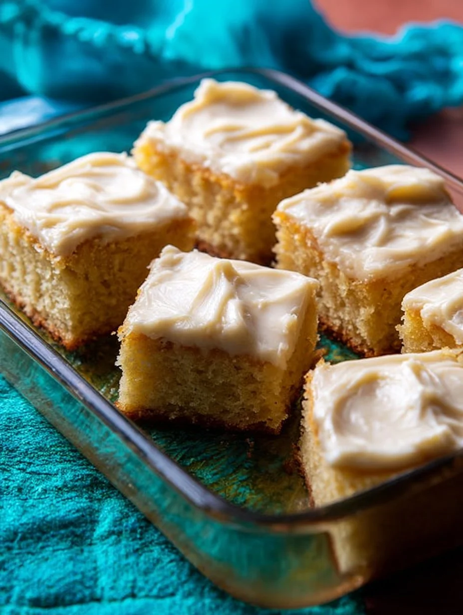 Delicious banana cake with cream frosting and sliced bananas on top
