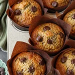 Delicious banana chocolate chip muffins, super moist and bakery-style, fresh out of the oven